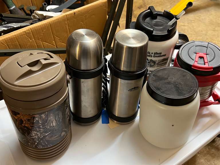 Two thermoses and three large plastic drink containers Northern