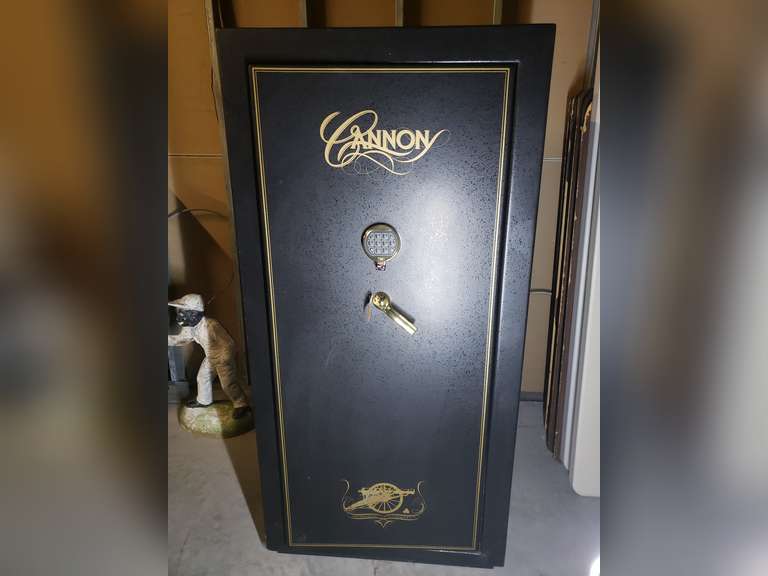 Cannon gun safe with adjustable shelves and code entry 26x62x30in