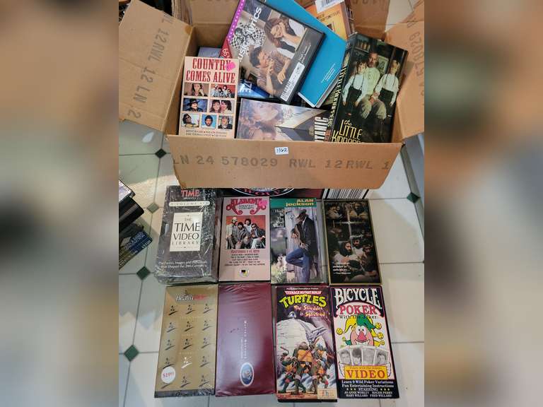 Box of VHS Tapes Northern Kentucky Auction, LLC