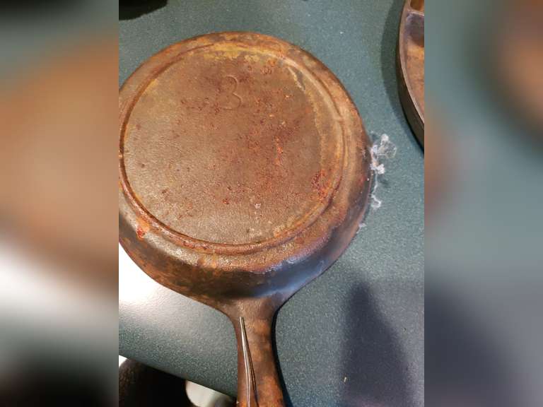 Cast iron cornbread pan marked 8 and a mini cast iron pan marked 3