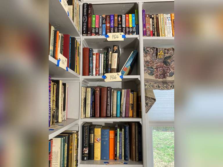 Four shelves of books, bring your own boxes to pack. Books do not ship