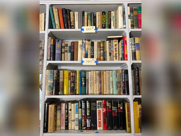 Four shelves of books, bring your own boxes to pack. Books do not ship