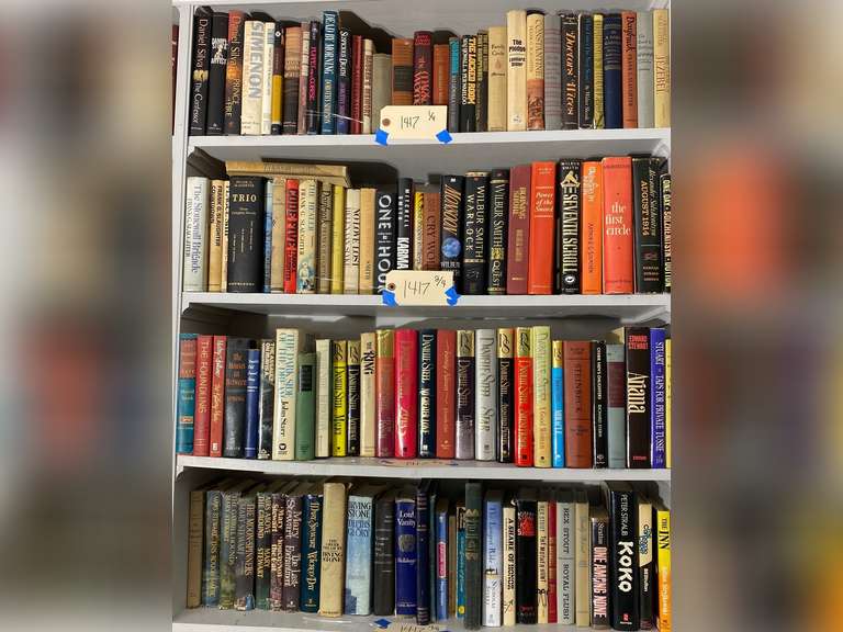 Four shelves full of books, must bring them boxes to pack. Books do not