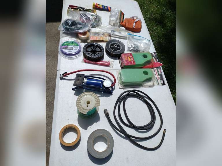 Assorted weed eater, mower parts, etc.