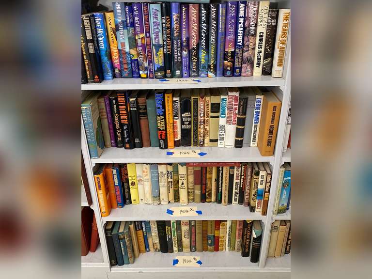 Four shelves of books, bring your own boxes to pack. Books do not ship