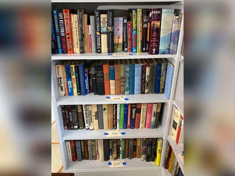 Four shelves of books, bring your own boxes to pack. Books do not ship