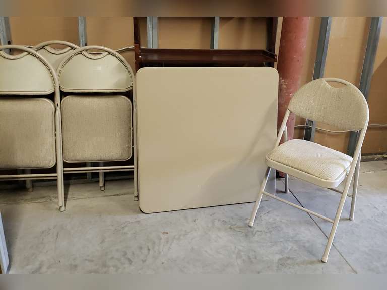 Costco card table and 4 cushioned folding chairs one seat ripped