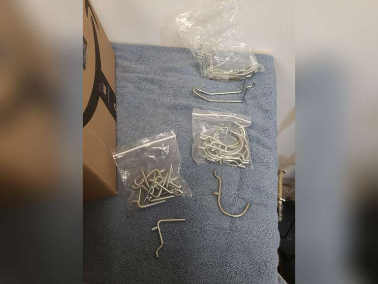 Box of peg board display hooks Northern Kentucky Auction, LLC