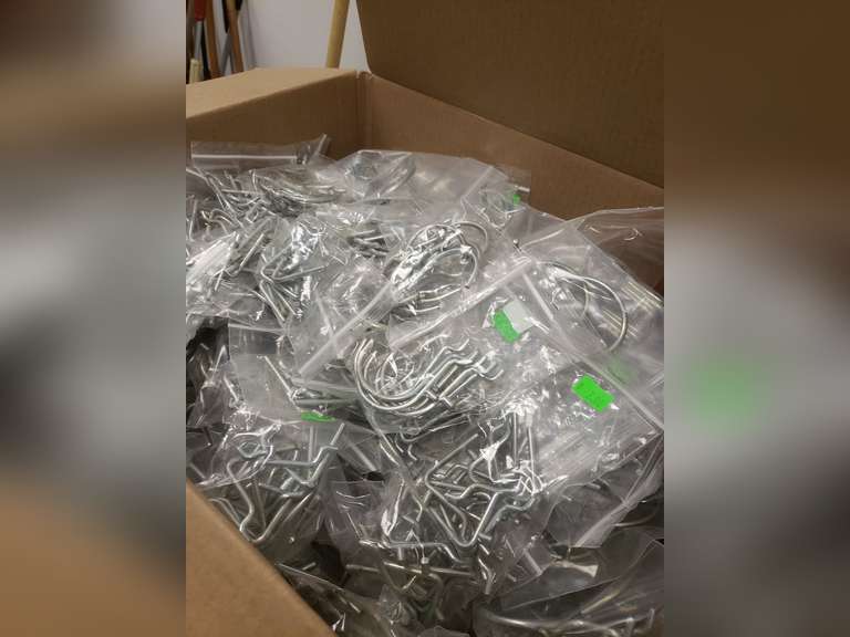 Box of peg board display hooks Northern Kentucky Auction, LLC