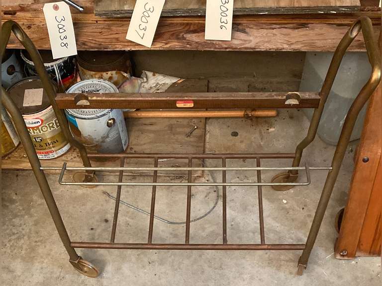 Two portable blackandwhite TVs and a stand. Sony TV turns on, Sears