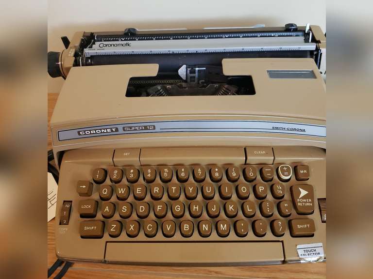 Electric portable super 12 with Xtra ribbon, powered on