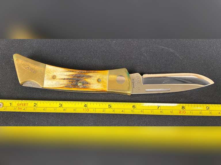 Large Case folding knife with three extra blades and leather sheath