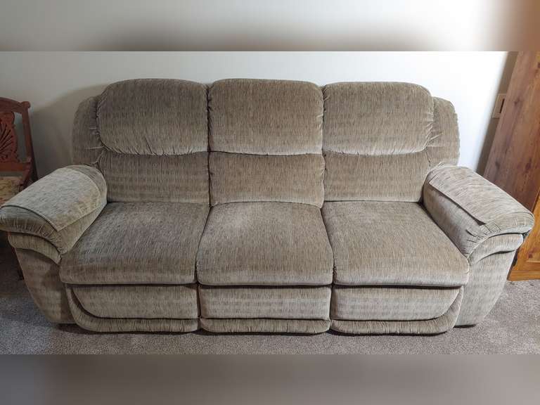 Couch recliner, the left recliner back is loose