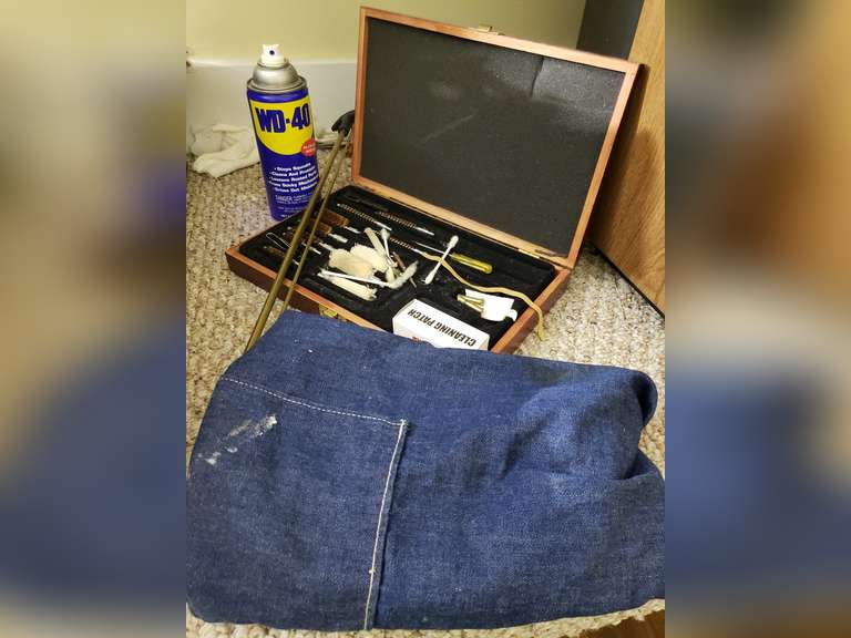 Gun cleaning kit with apron