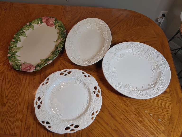 Four large serving plates