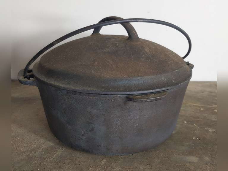 Cast iron Dutch oven with self basting lid