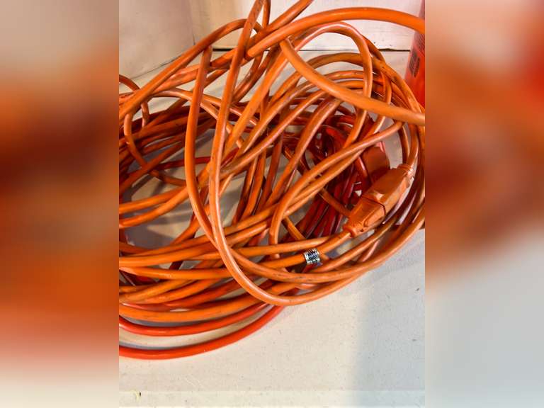 5 Gallon bucket with two extension cords.