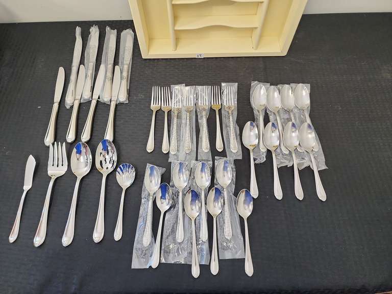 Lenox flatware with storage box 8 knives, 7 salad forks, 8 soup spoons, 8 teaspoons, 5 serving