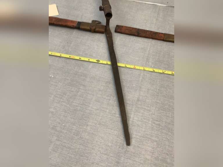 Sword case and affixed to a piece of wood. Northern Kentucky