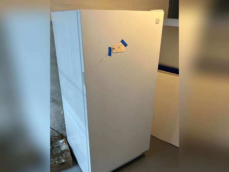 Kenmore upright freezer. Plugged in and workingmeasurements are 5 foot