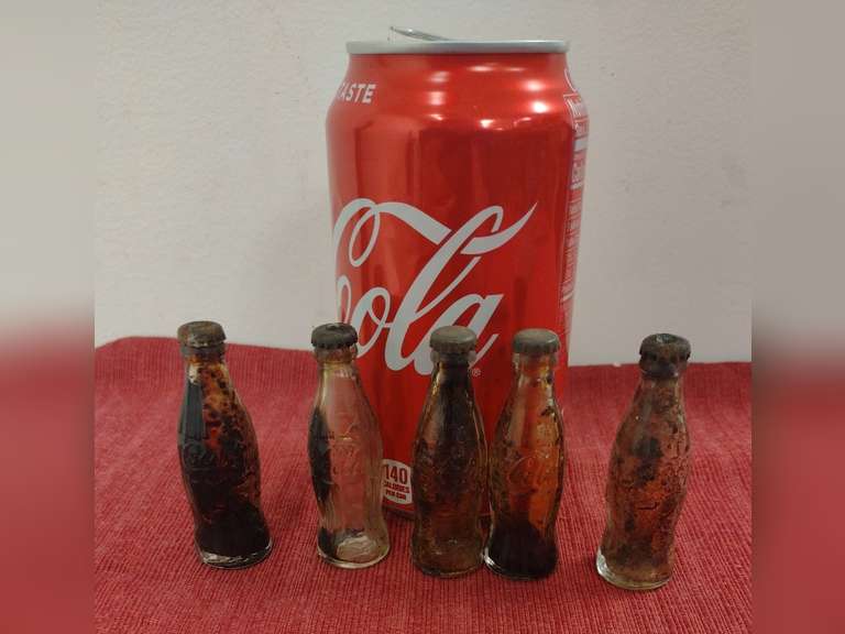 5 Mini CocaCola bottles. Northern Kentucky Auction, LLC
