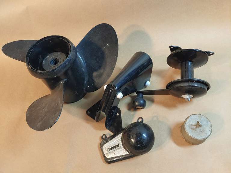 Boat propeller and anchor hoist and two small anchors Northern