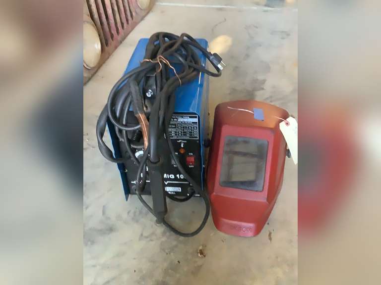 Easy Mig 100 Welder with helmet. Powered on. Northern Kentucky