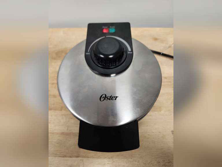 Oster waffle maker, model CKSTWF1DM, powers on