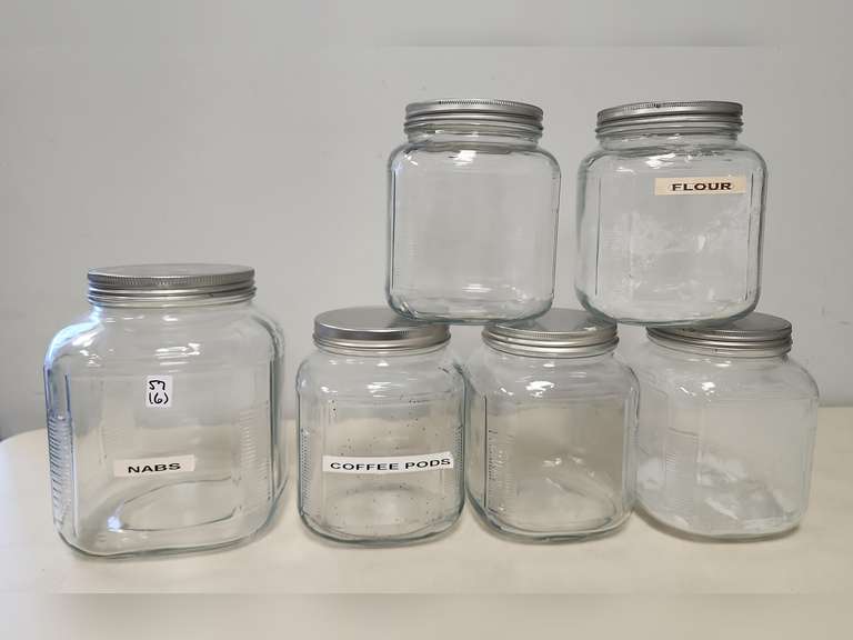 6 Glass canisters with metal lids