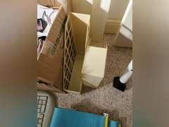 Box full of miscellaneous office supplies and accessories,  keyboard, binders, hanging folders