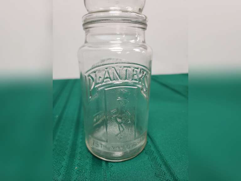 4 Planters 75th Anniversary jars Northern Kentucky Auction, LLC