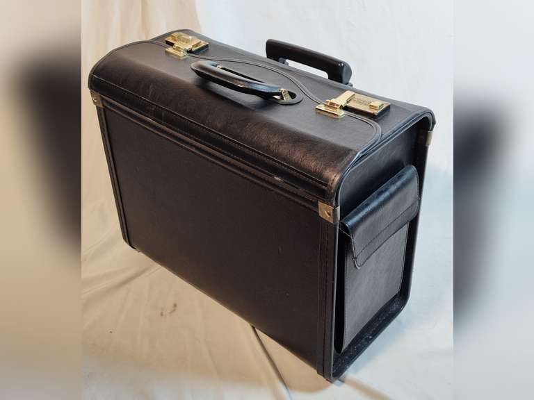 Huge business briefcase on rollers with handle, does show wear