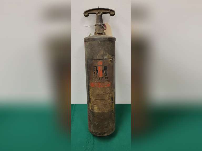 International Harvester Brass Fire Extinguisher Northern Kentucky Auction, LLC