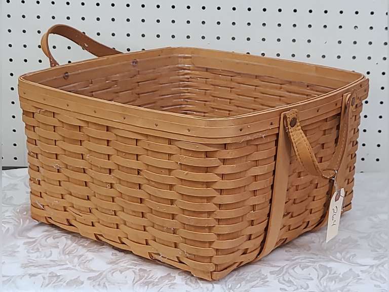 2000 Longaberger basket with leather handles and plastic protector Northern Kentucky Auction, LLC