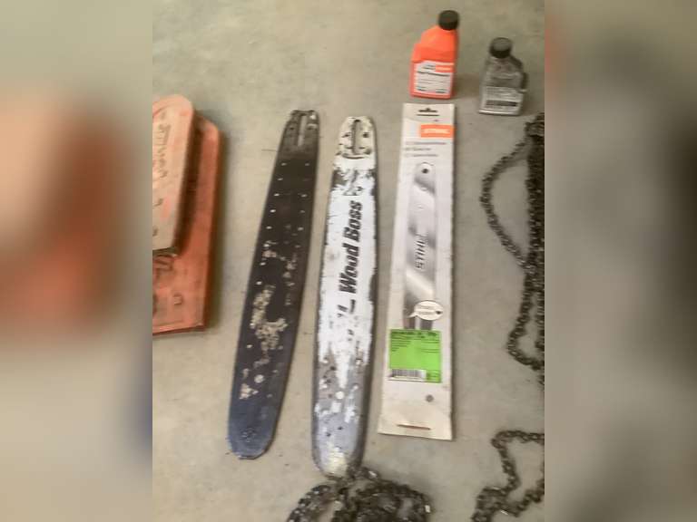 Guide bars, saw chains, 2 cycle oil. Northern Kentucky Auction, LLC