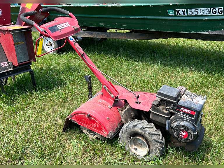 Huskey rear tine tiller with 5HP Briggs and Stratton motor. Started