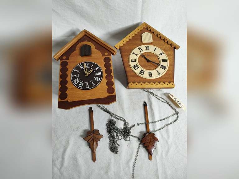 Two cuckoo clocks no weights, untested Northern Kentucky Auction, LLC