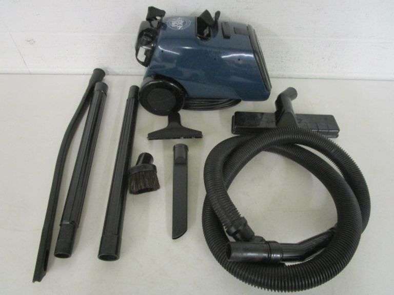 Royal Dirt Devil Canister Vacuum w/Attachments Oberman Auctions