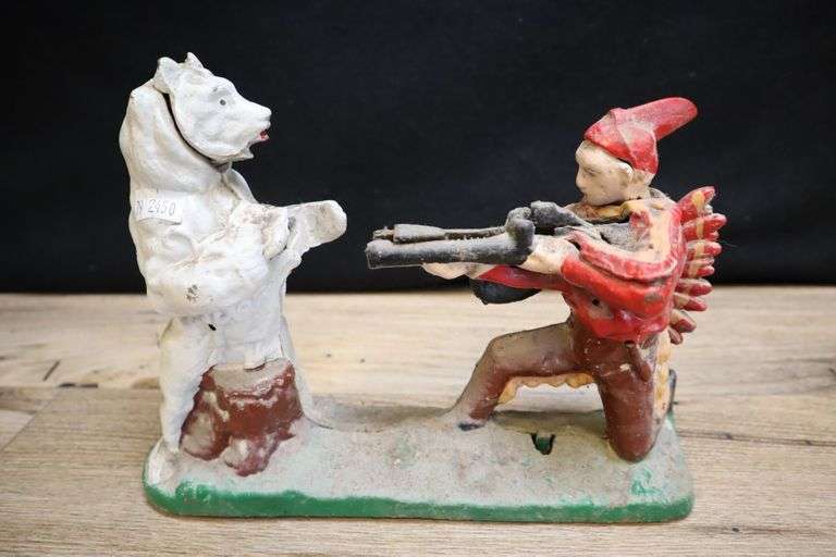 Vintage Cast Iron Bear Hunter Coin Bank Pacific Auctions And Appraisals