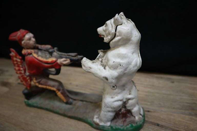 Vintage Cast Iron Bear Hunter Coin Bank Pacific Auctions And Appraisals