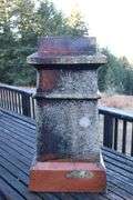TERRA COTTA CHIMNEY POT, 11X11X23"H, 40#, HAS LICHEN ATTACHED
