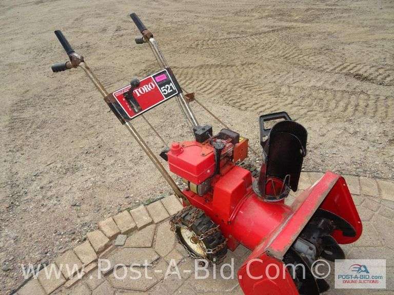 Toro Snowblower 521 5 HP, 24" Elsenpeter Auctions & Real Estate, Inc