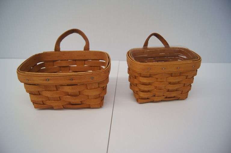 2 Longaberger baskets with Liner and protector Parrott