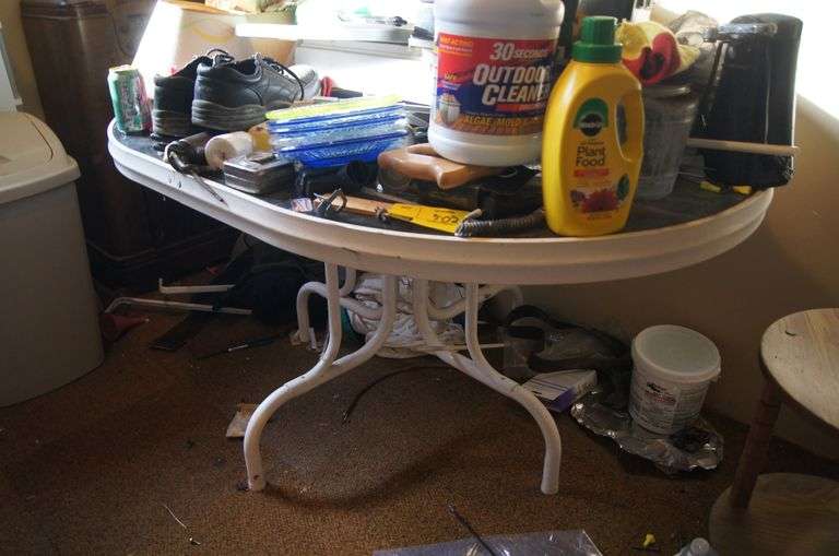 Glass top patio table Parrott