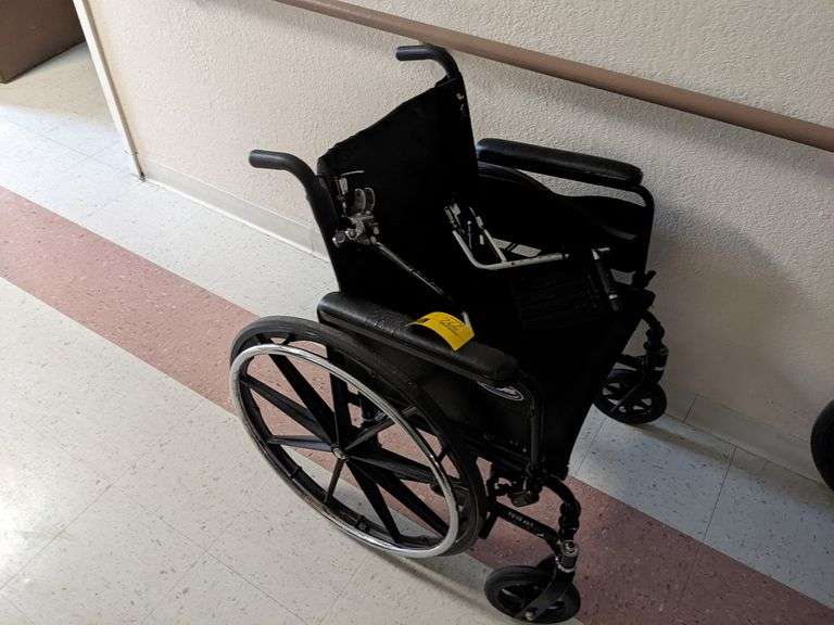 Invacare Wheelchair with Leg Supports Parrott