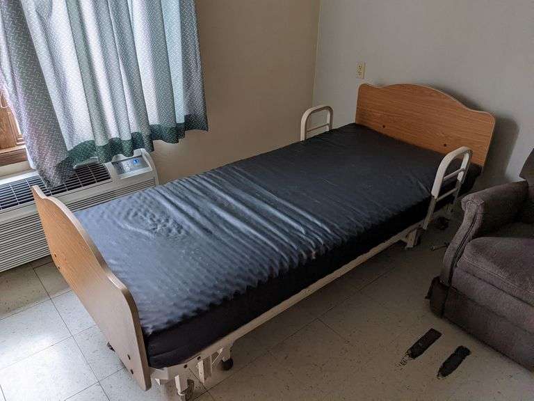 Pair of Joerns Manual Adj. Hospital Beds Parrott