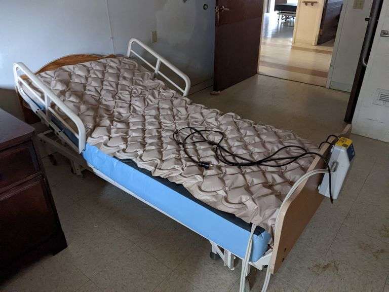 Pair of Joerns Manual Adj. Hospital Beds Parrott