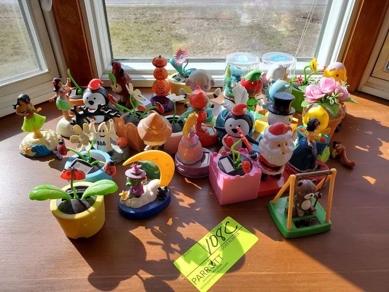 Large lot of solar powered bobbleheads Parrott Marketing Group