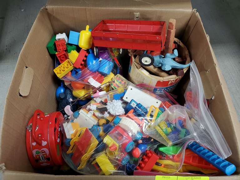 Large box of children's toys, many dinosaurs and more Parrott