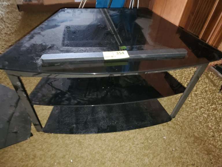 Modern black glass entertainment center Parrott Marketing Group